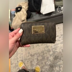 Michael Kors compact brown and gold monogrammed logo-d wallet